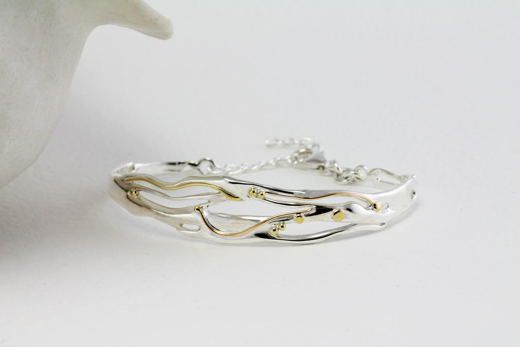 Banyan Taw Sterling Silver Bracelet with Gold Detailing the secret garden UK